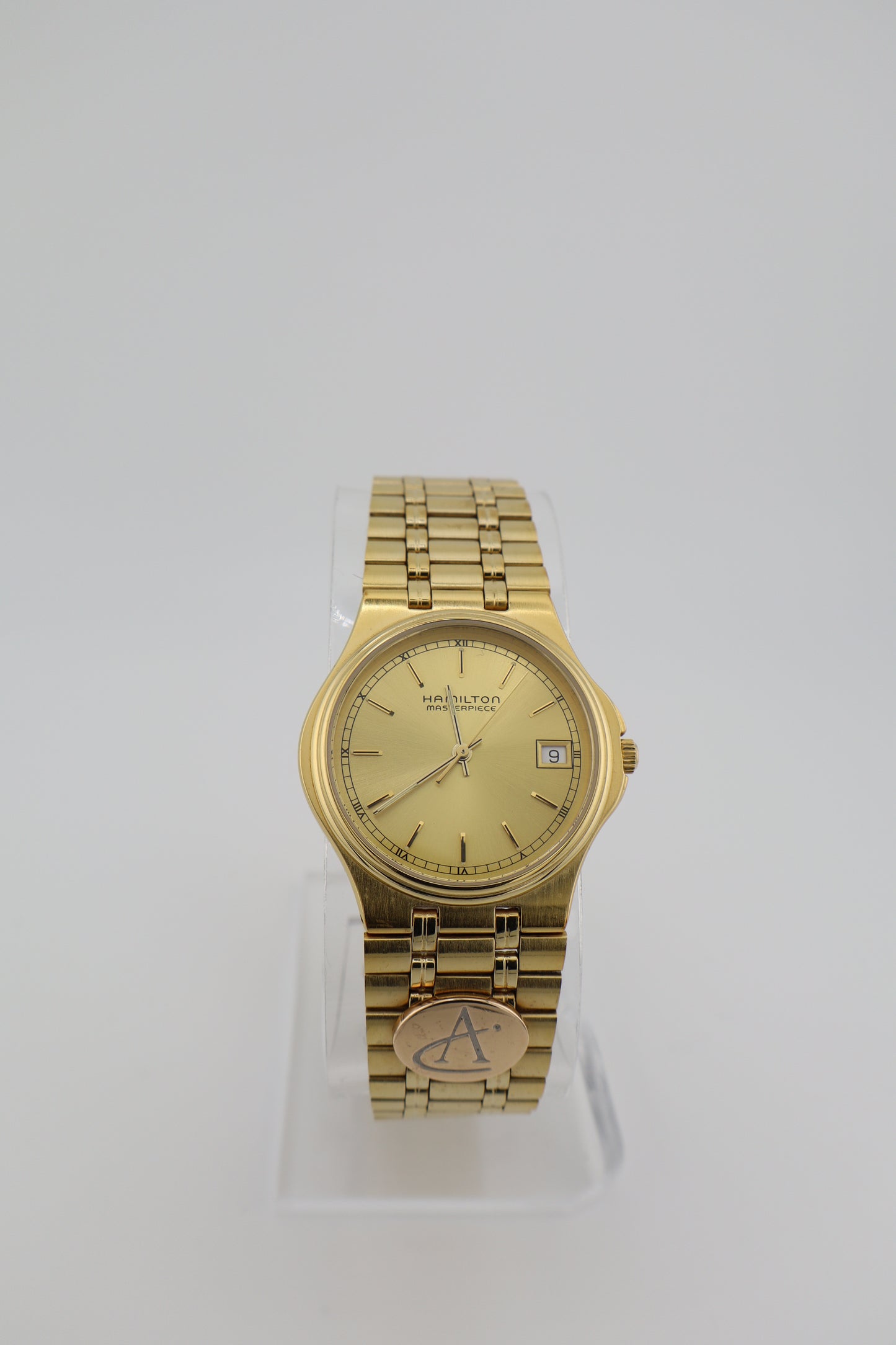 Vintage Hamilton Masterpiece Quartz Men's Watch with 10k Gold Charm
